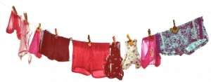 Pairs of innerwear hanging on a cloth line. how many pairs of underwear should a woman own, how many pairs of underwear should i have, learn about when to replace your underwear
