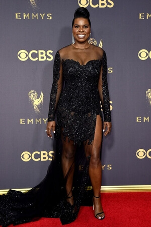 Leslie Jones looking fabulous in a thigh-high slit and custom-made Christian Siriano dress at the 2017 Emmy’s 