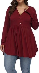 A lady showcasing the ALLEGRACE Women's Plus Size Henley V Neck Button Tunic Top, Long sleeve Swing Flowy Shirt, one of the Best Plus Size Tunic Tops to Wear With Leggings