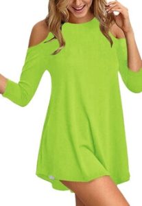 A lady modeling the Afibi Women’s Cold Shoulder 3/4 Sleeve Swing Tunic Tops for Leggings