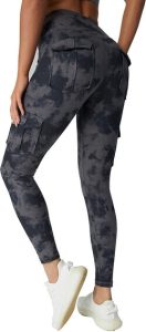 A Woman Modelling the JEGGE High Waist Yoga Leggings with 4 Pockets, Tummy Control Workout Running 4 Way Stretch Cargo Pocket Leggings