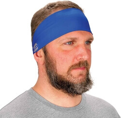 A model showing one style of wearing the 10. Ergodyne Chill Its 6634 Cooling Headband, Moisture Wicking Sports Headband for Men and Women